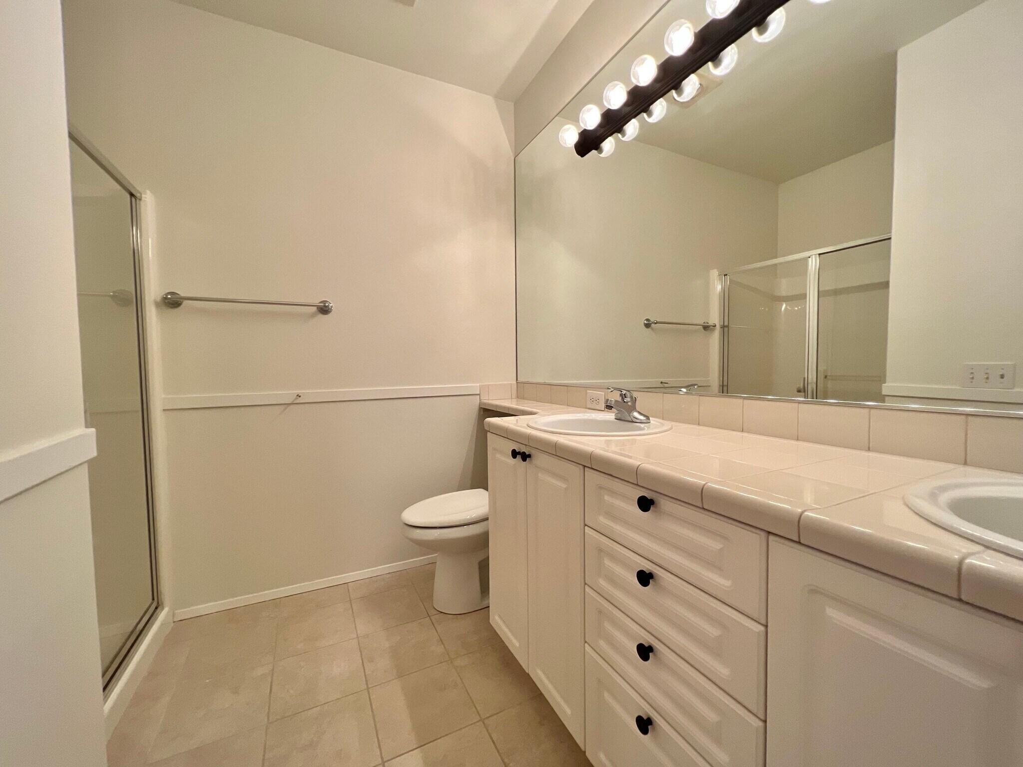 Primary bathroom with double vanity - 12712 Admiralty Way