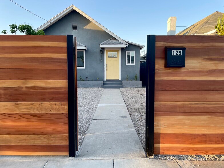 New wood fence provides security and privacy - 129 E Ave 36