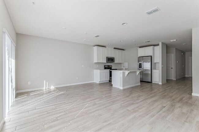 Building Photo - Stunning 3 bedroom, 2.5 bathroom townhome located in a highly desirable gated community