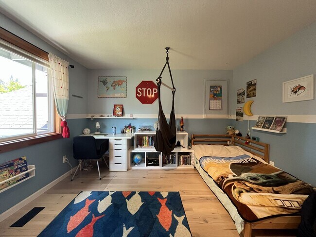 Building Photo - Bright and Open 4 Bedroom Cedar Mill Home with Vaulted Ceilings, Skylights & Multiple Living Areas