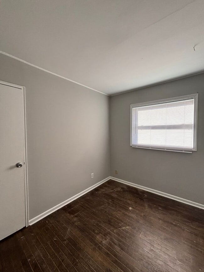 Building Photo - 3 BR 1.5 BA split-level with attached 1 ca...
