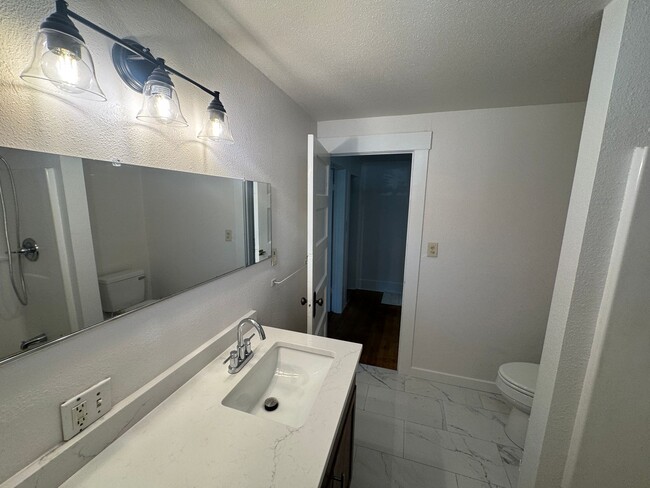 Building Photo - Non-Refundable & Security Deposit Total: $...