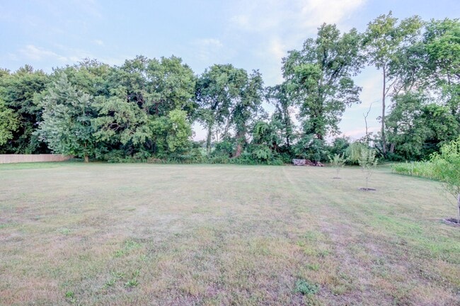 Building Photo - Stunning Brick Front Home With Fireplace A...