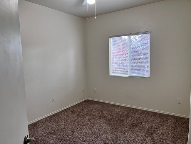 Building Photo - Wonderful 3 Br condo in gated community with the major appliances and 1 car garage.