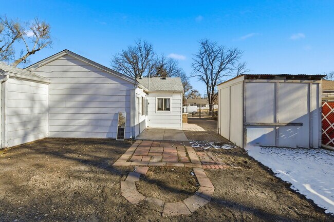 Building Photo - $1,930.95 - 3 Bedrooms, 1 Bathroom, Single Family Home in Aurora with fenced Yard!