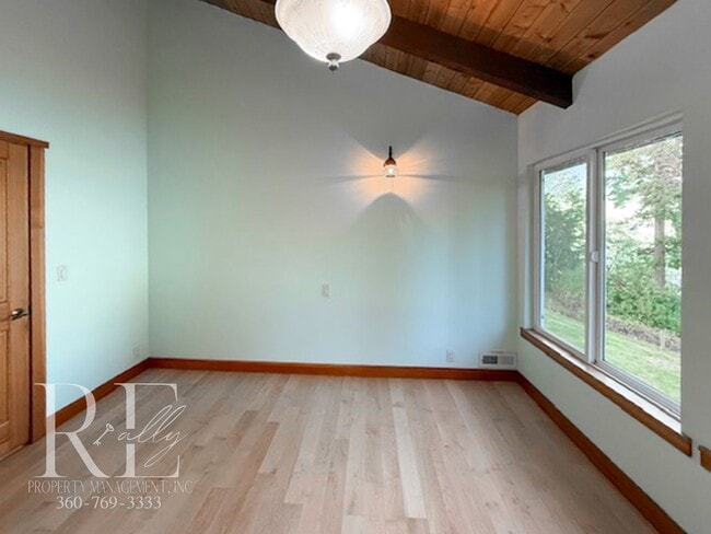 Building Photo - Waterfront Rustic Retreat with Vaulted Ceilings, Picture Windows & Lofted Nook