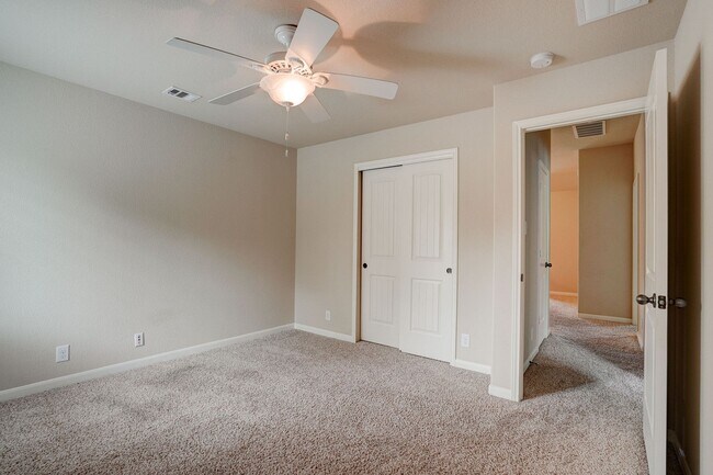 Building Photo - Bright & Roomy 4BR • 2.5BA • Two-Level Living