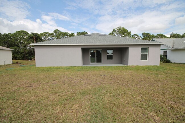 Building Photo - Stunning 4BR/2BA Palm Bay Retreat with Modern Upgrades & Oversized Lot!!