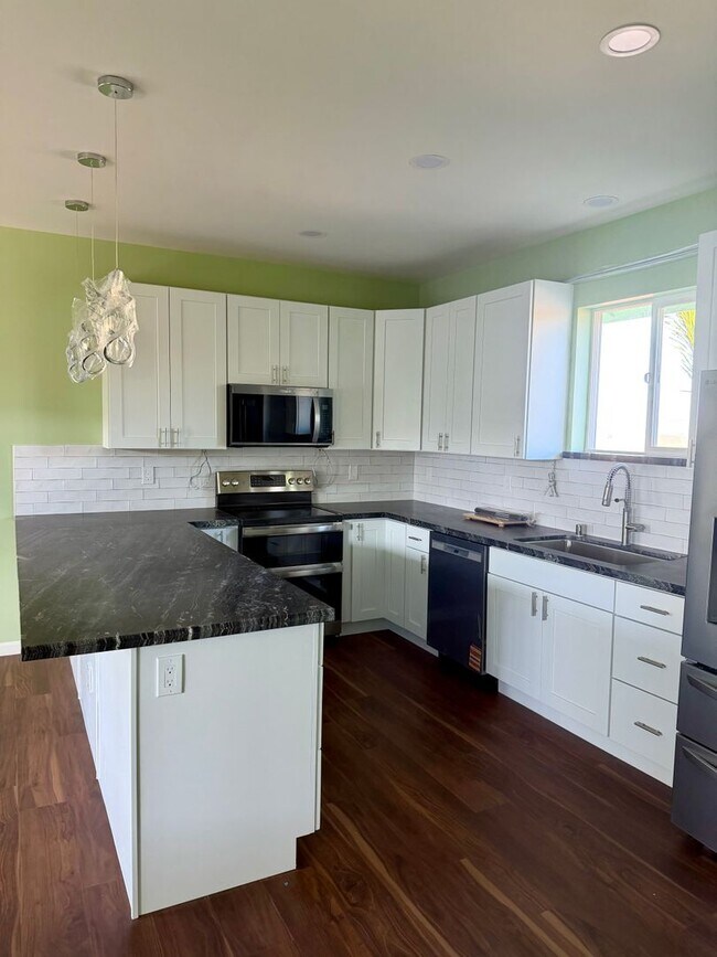 Building Photo - 1276 S Nahale Pl