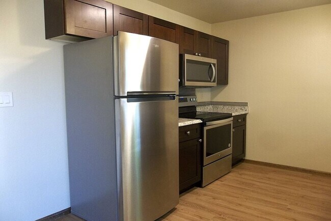 Building Photo - Classic Fort Collins Home Available This August