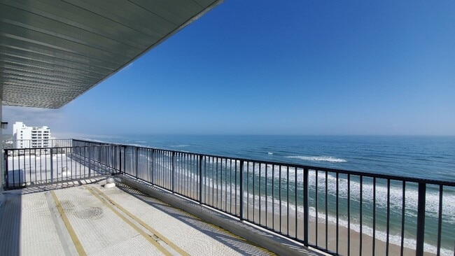 Building Photo - Oceanfront Poolside 2/2 Condo