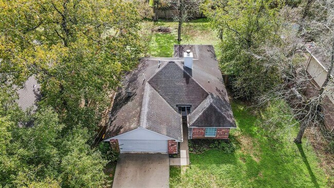 Building Photo - 6719 Woodland Oaks