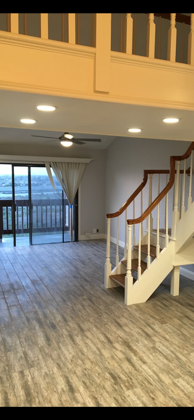 Family Room with Stone Gas Fireplace - 2205 Pacific Ave