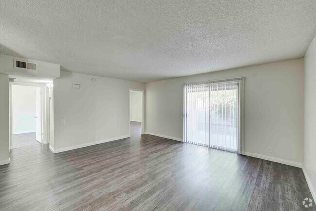 2BR, 1BA - 845SF - Living Room - Casa Del Cielo Apartments