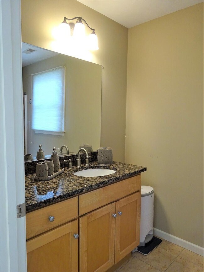 Guest Bath with Granite counter tops - 24 Autumn Ln