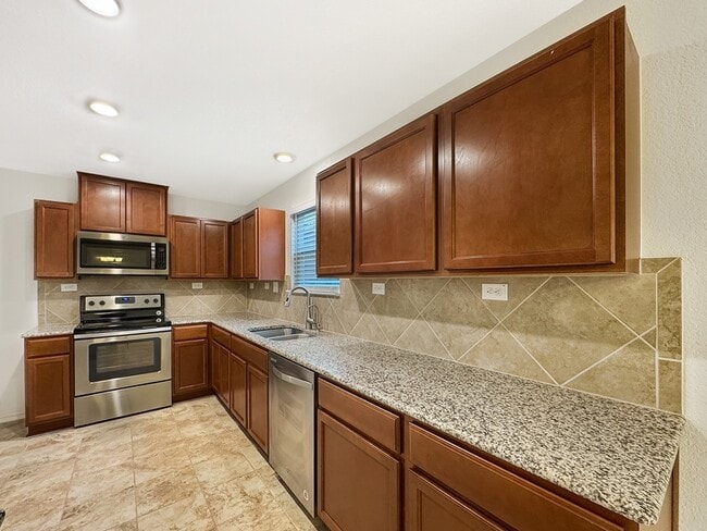 Building Photo - 8018 Assumption Dr