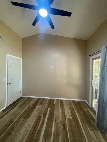 BR 1 w/walk in closet and patio entry - 8140 N 107th Ave