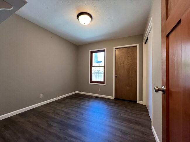 Building Photo - Spacious 4-Bedroom Retreat Just Steps from...