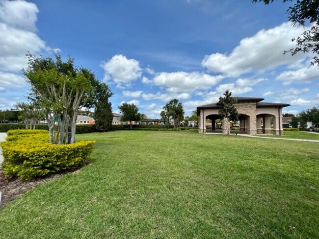Building Photo - EAGLE CREEK LAKE NONA! WELCOME HOME! Beautiful water views! Spacious 2 story-3 bedroom 2.5 bath h...