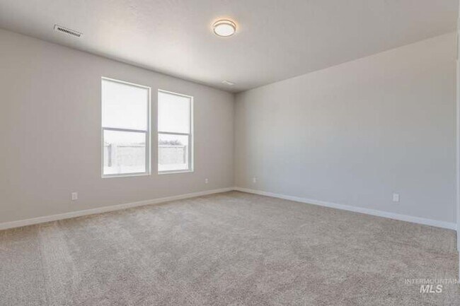 Building Photo - 4 Bed 2 Bath in Meridian with 3 Car Garage
