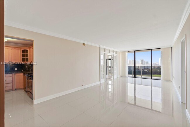 Building Photo - 3675 N Country Club Dr