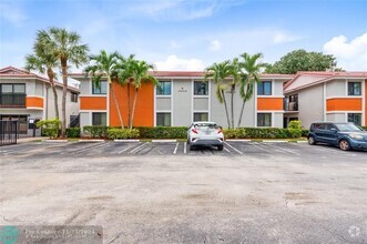 Building Photo - 10622 Royal Palm Blvd