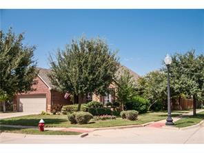 Building Photo - Former model home on corner lot is ready for move in!