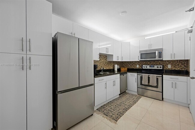 Building Photo - 10185 Collins Ave