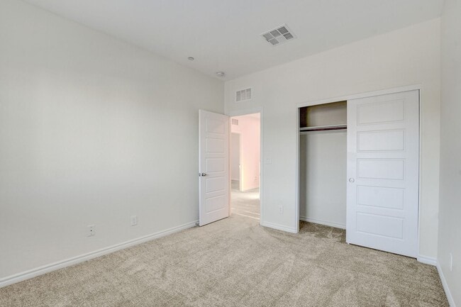 Building Photo - 4 Bedroom Townhouse in Tule Springs Coming Soon!