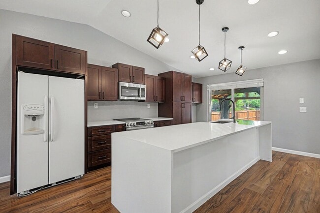 Building Photo - Updated 4BR Corner Lot Home with Finished Basement & 2-Car Garage