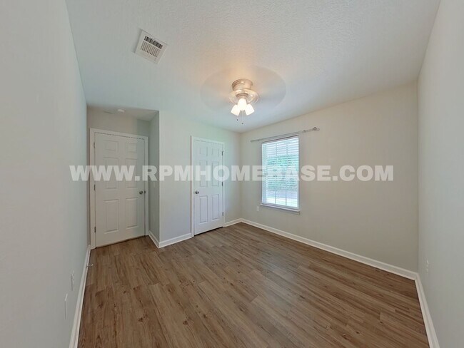 Building Photo - Your Baker Sanctuary with Spacious Backyar...