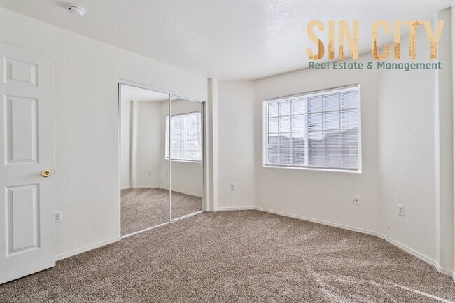 Building Photo - "Spacious 3-Bedroom Condo Oasis with 2 Baths in Vibrant Las Vegas!"