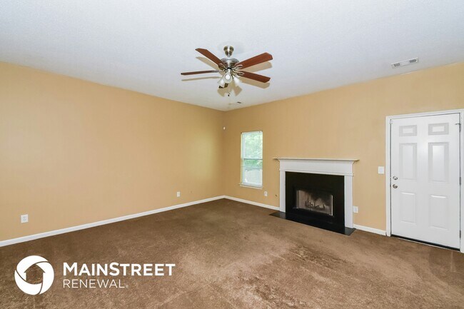Building Photo - 7416 Petal Pl