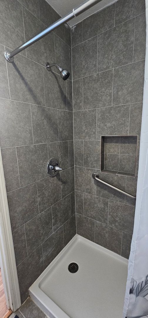 Building Photo - -First-Floor End-Unit | Fully Furnished 2B...