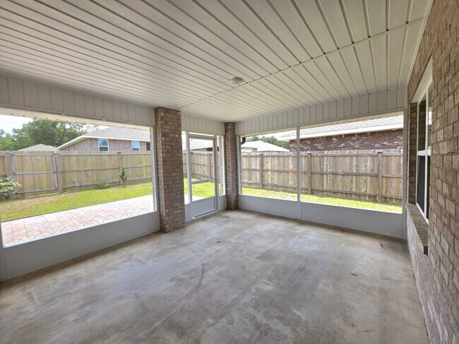 Building Photo - Bright, Open Layout | Screened Porch + Paver Patio | Move-In Ready