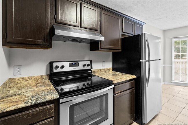 Building Photo - 6924 Woodmark Dr