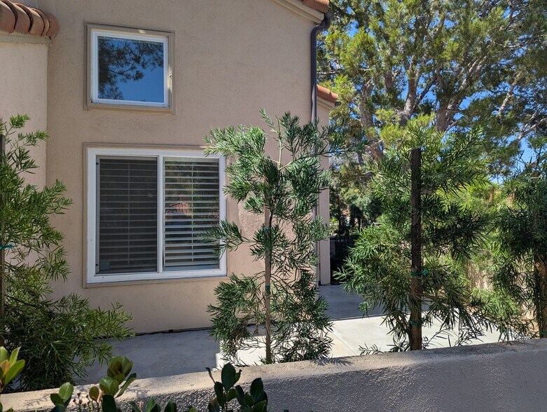 partial view of wraparound patio - 20 Corsica Dr