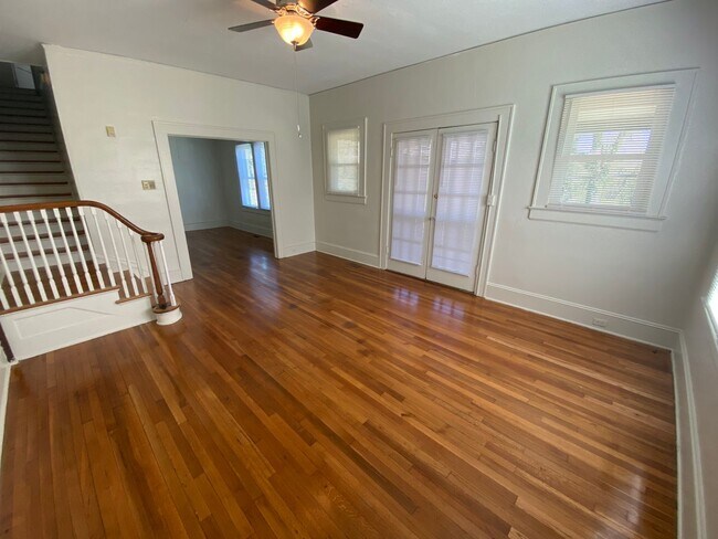 Building Photo - 1,550 square feet in Trinity Park. High ceilings, French doors, and a porch worth sitting on.