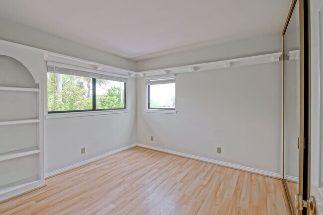 Building Photo - PRIME POOLFRONT LOCATION & CLOSE TO MAIN GATE! BRIGHT & SPACIOUS, END-UNIT POOLFRONT TOWNHOUSE W/...