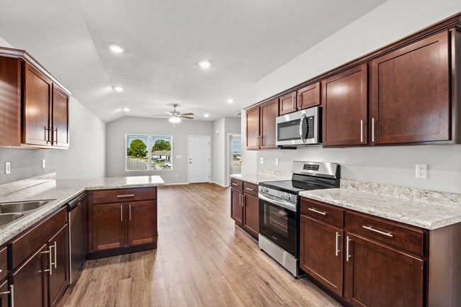 Building Photo - Charming Curb Appeal Meets Modern Comfort in the Monaco Plan!