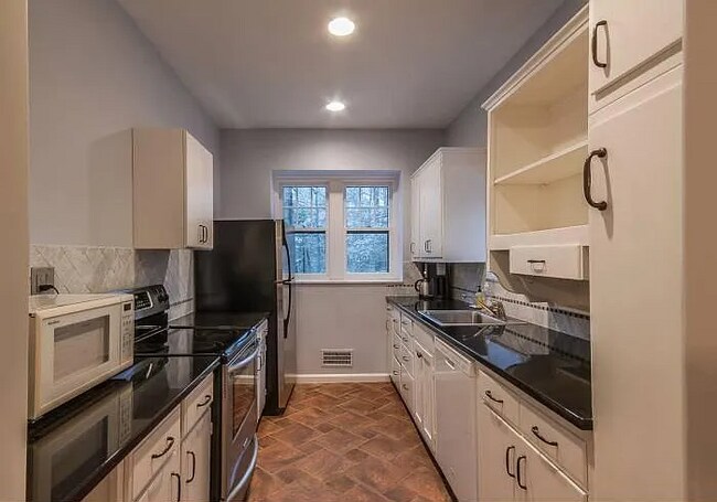Building Photo - Welcome to the Stone House, a charming 3-bedroom, 2-bathroom