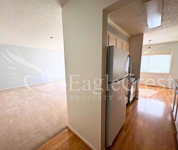 Building Photo - Convenient 3 Bedroom 2 Bathroom Condo Living With POOL Access