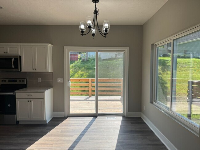 Building Photo - Luxury Bennington Townhome Ready For Move In