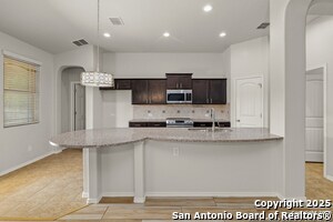 Building Photo - 7506 Elegante Way