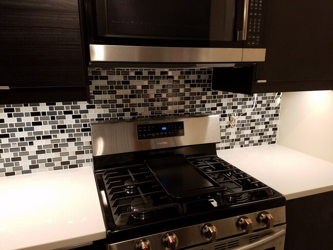 Updated Kitchen. Light switches and receptacles also updated. Pic was taken before it was installed. - 301 N Beauregard St