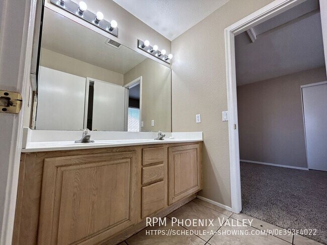 Building Photo - 8239 W Voltaire Ave