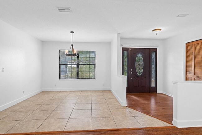 Building Photo - **Available February 2026***Welcome Home :: 3/2 with oversized fenced backyard in Indian Pines!