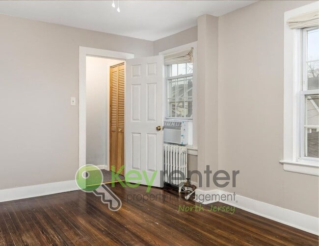 Building Photo - Spacious 3-Bed, 2-Bath Nutley Home with Bonus Office, Multi-Level Deck & Quiet Location