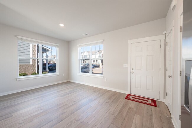 Building Photo - **BE THE LUCKY ONE TO LIVE IN THIS 2022-BUILT END-UNIT TOWNHOME IN BLACKMAN STATION**