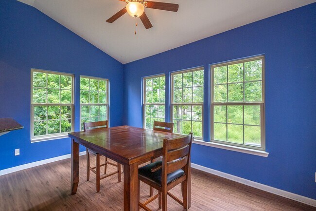 Building Photo - Spacious 4-Bedroom Home with Sunroom, Deck...